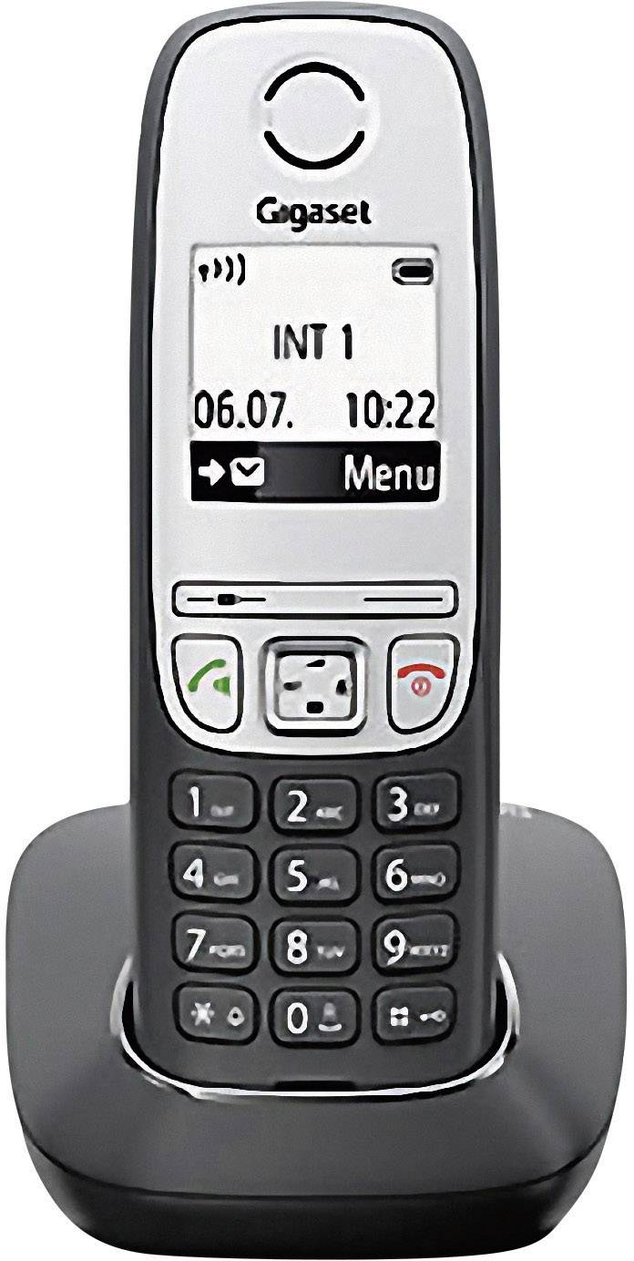 Bezprzewodowy telefon z cyfrowym wyświetlaczem w stacji ładującej, pokazujący datę i godzinę. Duże, ponumerowane przyciski poniżej.