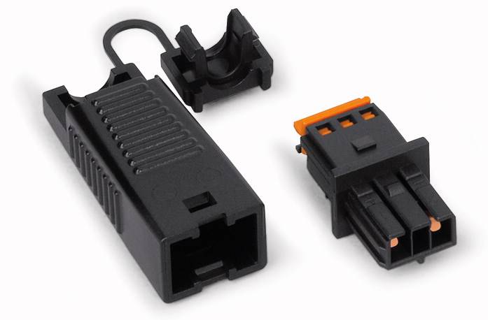 Dwa czarne elektryczne złącza z pomarańczowymi elementami, leżące obok siebie. Jedno jest otwarte, ukazujące styki.