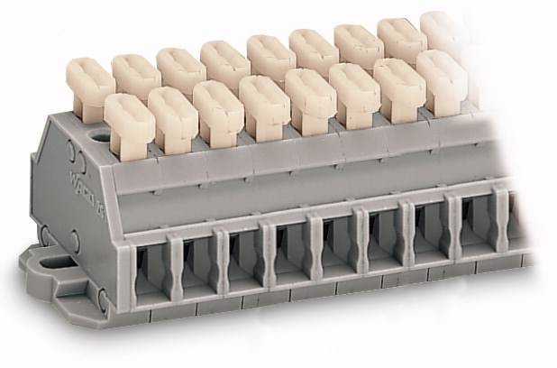 Stos zacisków elektrycznych, w kolorach szarym i beżowym, służących do łączenia przewodów.