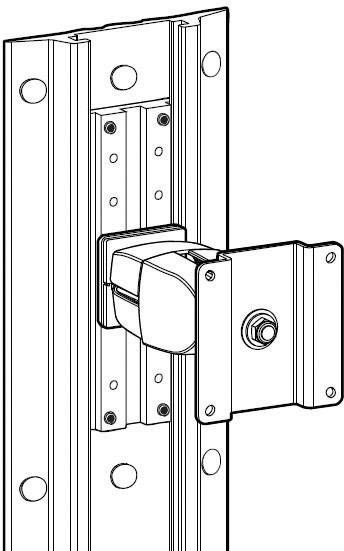 Rysunek techniczny zacisku zamontowanego na szynie pionowej. Przedstawia pozycje śrub oraz mechanizm mocowania.
