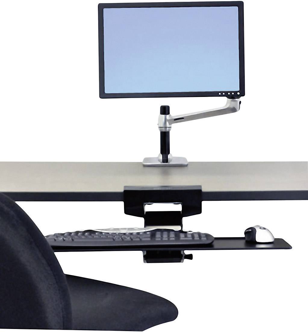 Monitor na ramieniu obrotowym umieszczony nad biurkiem, pod spodem klawiatura i mysz na wysuwanej szufladzie.