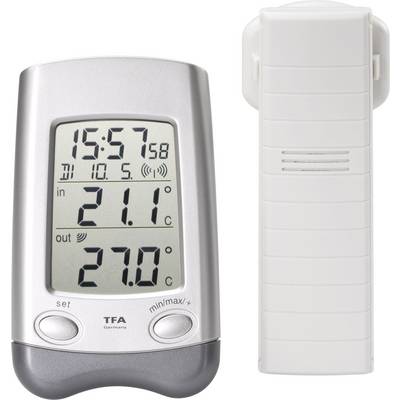 Cyfrowy termometr z czujnikiem zewnętrznym. Wyświetla godzinę, temperaturę wewnętrzną i zewnętrzną. Wartości temperatury wynoszą 21,1°C wewnątrz i 27,0°C na zewnątrz.
