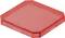 Czerwony plastikowy kwadrat, lekko wypukły, prawdopodobnie element gry lub układanki, na białym tle.