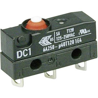 Czarny mikroswitch z czerwonym przyciskiem oraz opisami specyfikacji elektrycznych i znakami dopuszczenia.