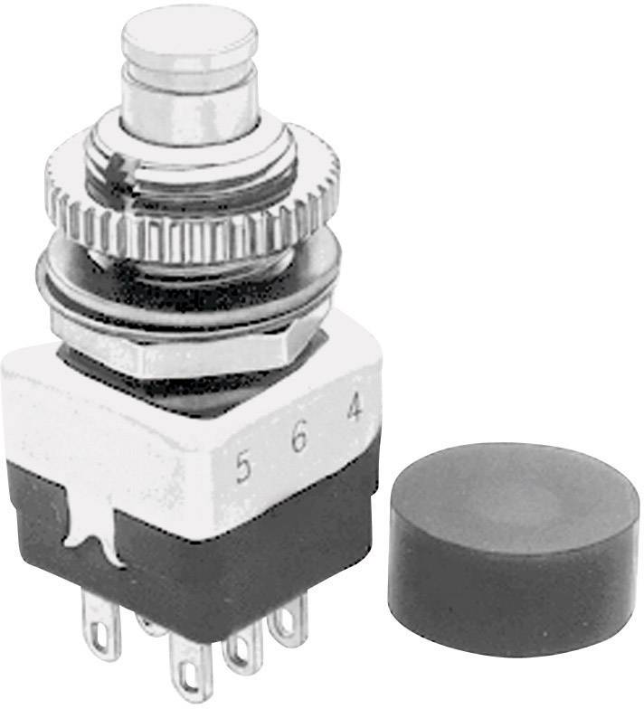 Sześciobiegunowy przycisk i osobna gumowa nasadka. Przycisk posiada obrotowy metalowy pierścień i jest utrzymany głównie w kolorze srebrnym.