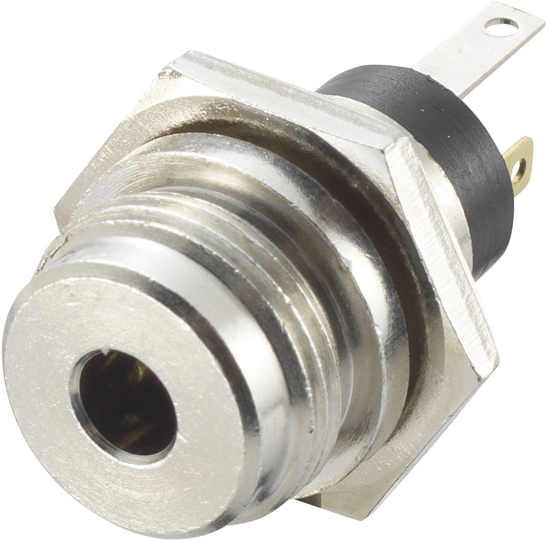 Metalowy złącz audio z dwoma przyłączami, służący do łączenia urządzeń audio.
