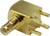 Złoty złącze z trzema stykami, typowo stosowane w połączeniach elektronicznych.
