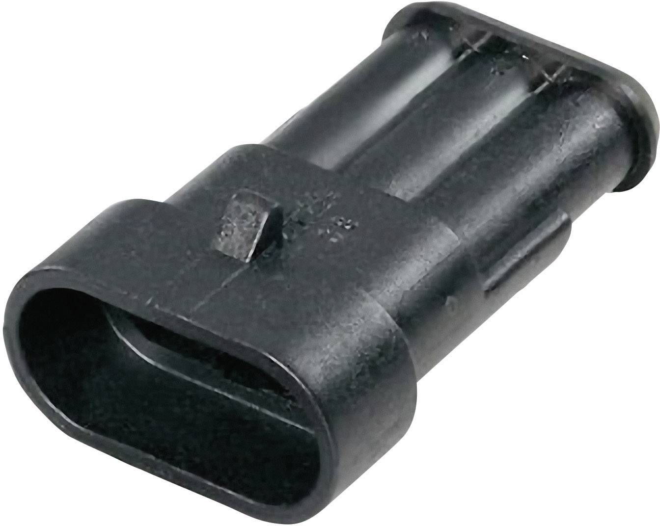 Czarny, prostokątny wtyk plastikowy z zaokrąglonymi krawędziami.