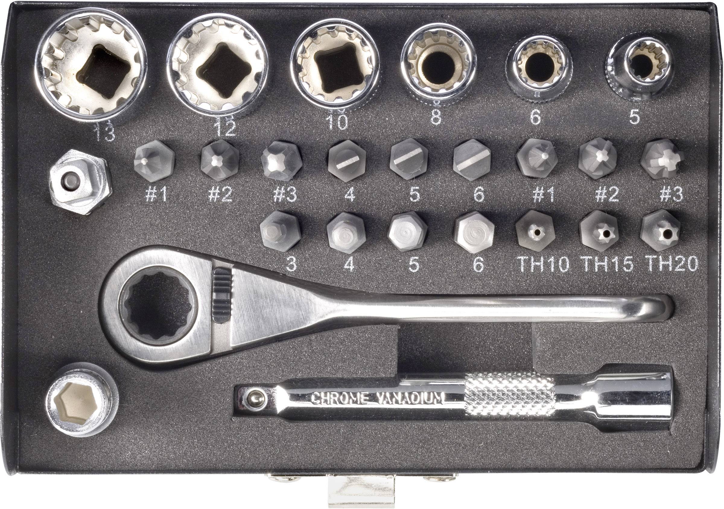 Zestaw końcówek narzędziowych w pudełku, w tym główki sześciokątne i torx oraz grzechotka, ułożone na czarnym tle.