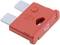 Czerwona płaska bezpieczka z napisem '40', przystosowana do 32 V, stosowana w urządzeniach elektronicznych do ochrony przed przepięciem prądowym.
