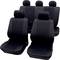 Pięć czarnych pokrowców na siedzenia samochodowe wykonanych z tkaniny, składających się z dwóch przednich oraz jednego ciągłego rzędu tylnego, wszystkie jednobarwne z zagłówkami.