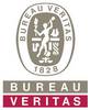 Logo 'Bureau Veritas' z owalnym emblematem przedstawiającym kobiecą postać z pochodnią, otoczoną tekstem i cyfrą '1828'.