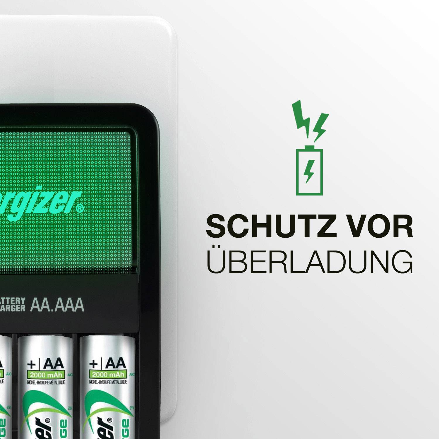 Nabíjačka batérií so štyrmi vloženými AA batériami a nápisom 'OCHRANA PRED PREBITÍM' vedľa. Logo Energizer je viditeľné.
