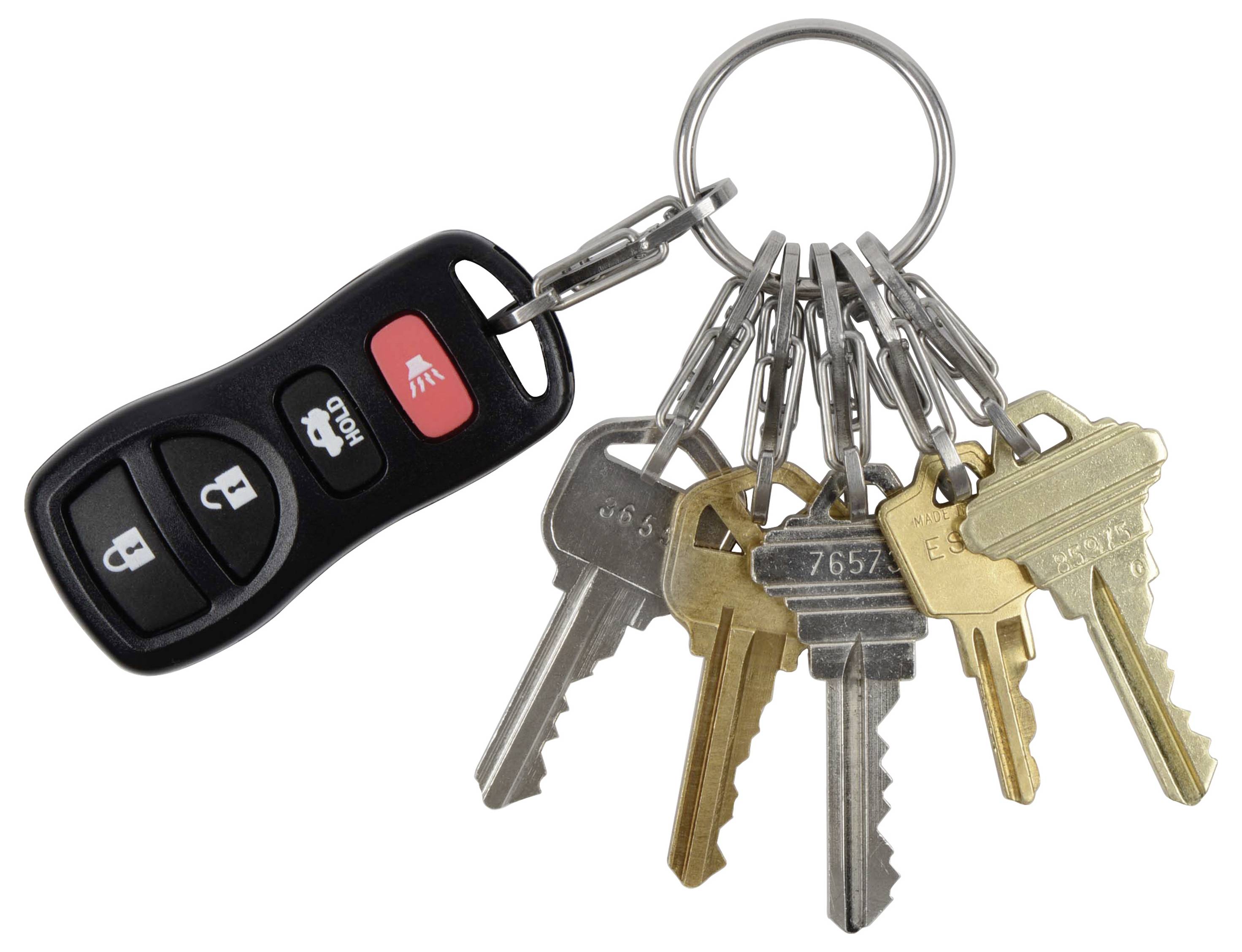 Sada šiestich kľúčov a čierneho automobilového diaľkového ovládača na spoločnom kľúčenke.