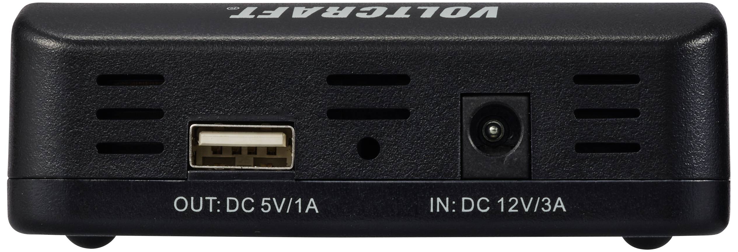 Zariadenie 'Voltcrafter' s USB výstupom (DC 5V/1A) a DC vstupom (12V/3A) na prednej strane, zobrazujúce vetracie štrbiny a konektory.