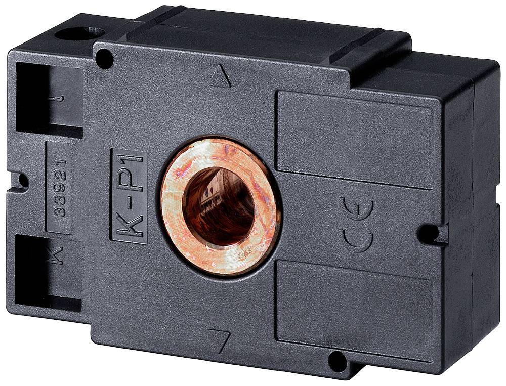 Čierny, obdĺžnikový elektrický prúdový senzor s medeným otvorom uprostred, označený ako 'K-P1'.