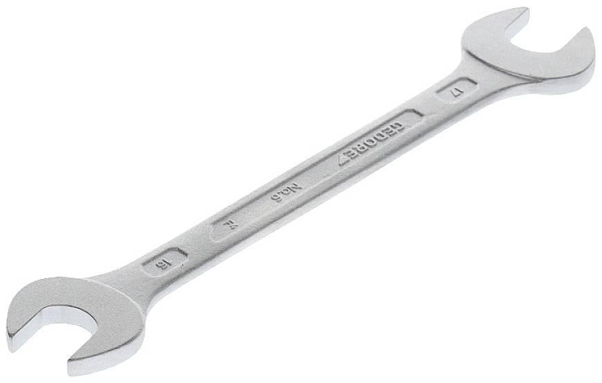 Kovový obojstranný kľúč s dvoma rôznymi veľkosťami otvorov na každom konci, používaný na uvoľňovanie a dotiahnutie matíc a skrutiek.