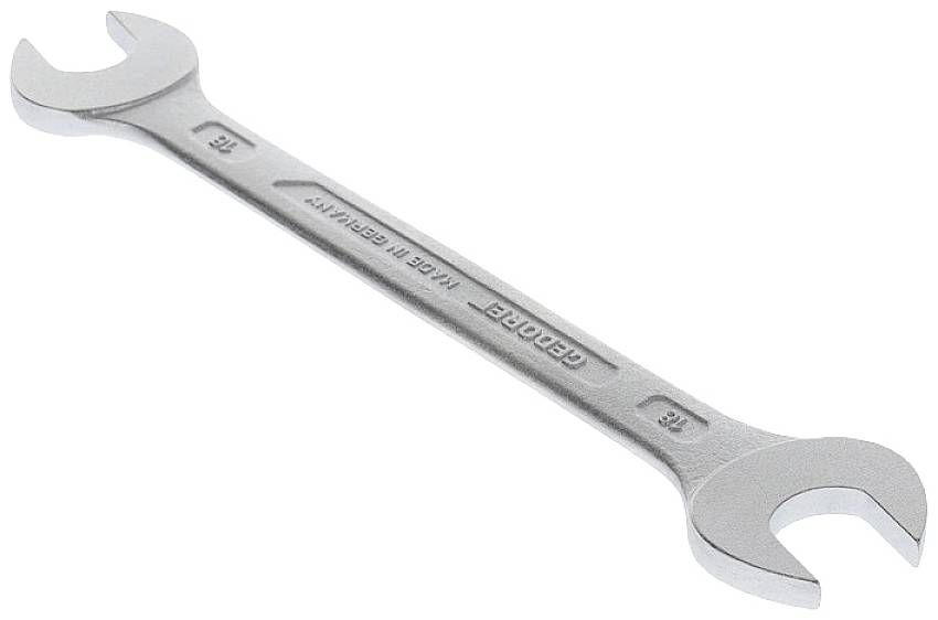 Strieborný obojstranný kľúč s veľkosťami 10 mm a 12 mm, položený naplocho, označený nápisom 'Chróm Vanádium'.