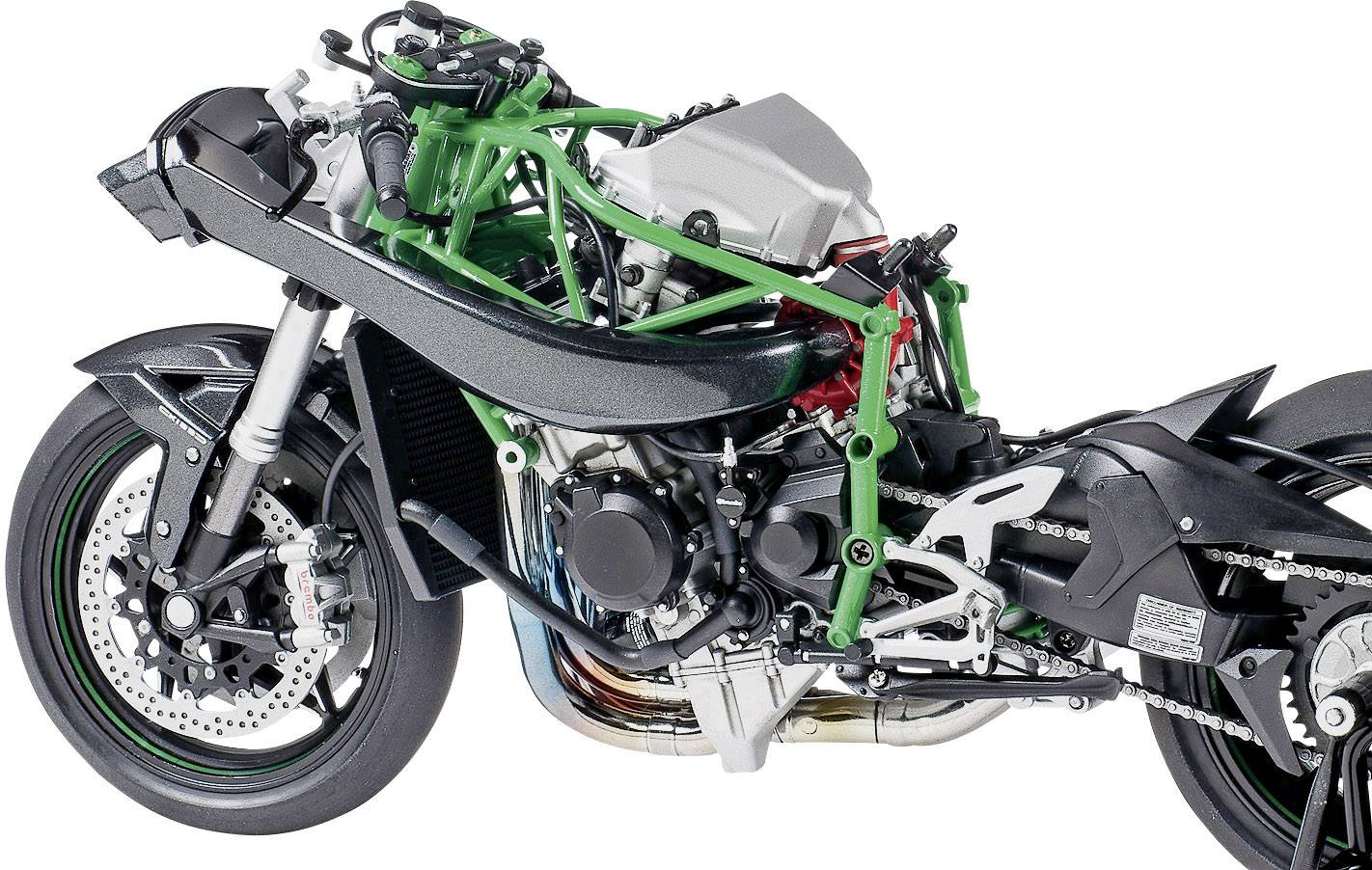 Rozobraný model motocykla odhaľujúci otvorené motorové komponenty a rám.