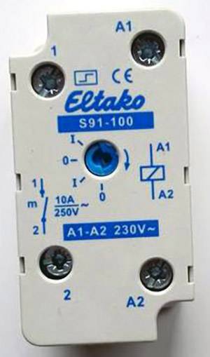 Elektrické relé s nápisom 'Eltako', model S91-100. Zobrazuje spínacie polohy 0 a 1, menovité napätie 230V, menovitý prúd 10A.