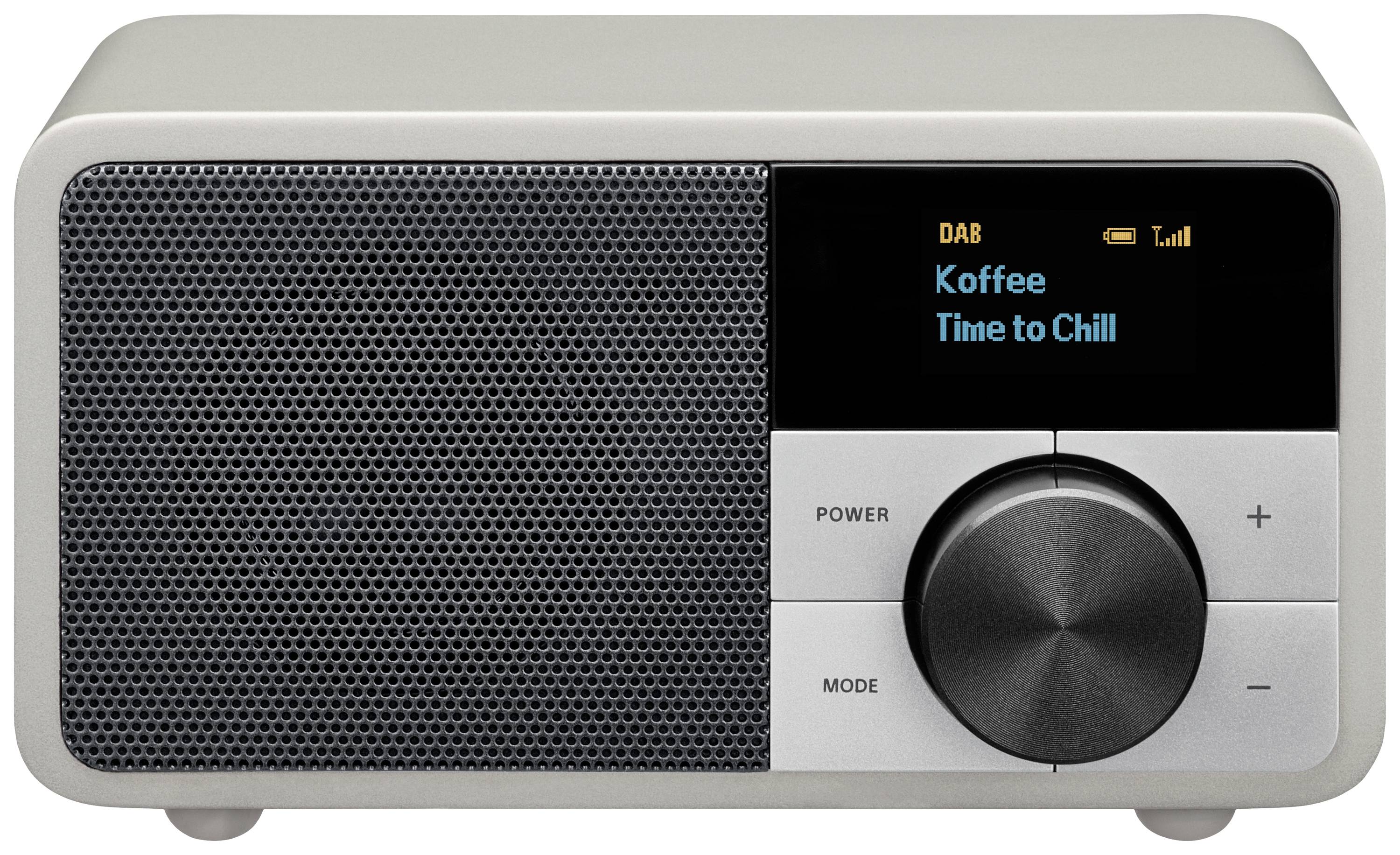 Digitálne rádio so sivým krytom a čiernym reproduktorom. Displej zobrazuje 'DAB', 'Koffee', 'Time to Chill'. Veľká tlačidlo hlasitosti.