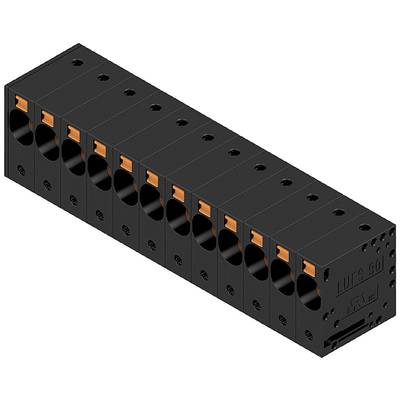 Čierny elektrický konektor s viacerými kruhovými prípojkami a oranžovými svorkami na hornej strane.