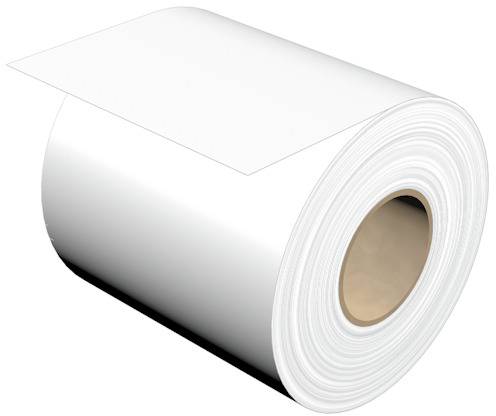 Veľká rolka bieleho papiera, zobrazená z boku, ukazuje hranu papiera.