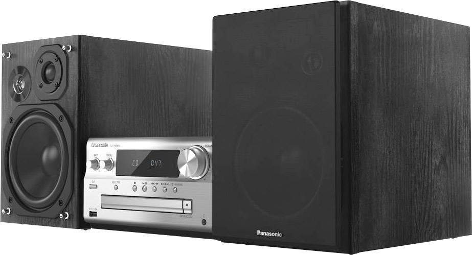 Stereo systém s dvoma čiernymi reproduktormi a strieborným hlavným zariadením s CD prehrávačom a displejom.