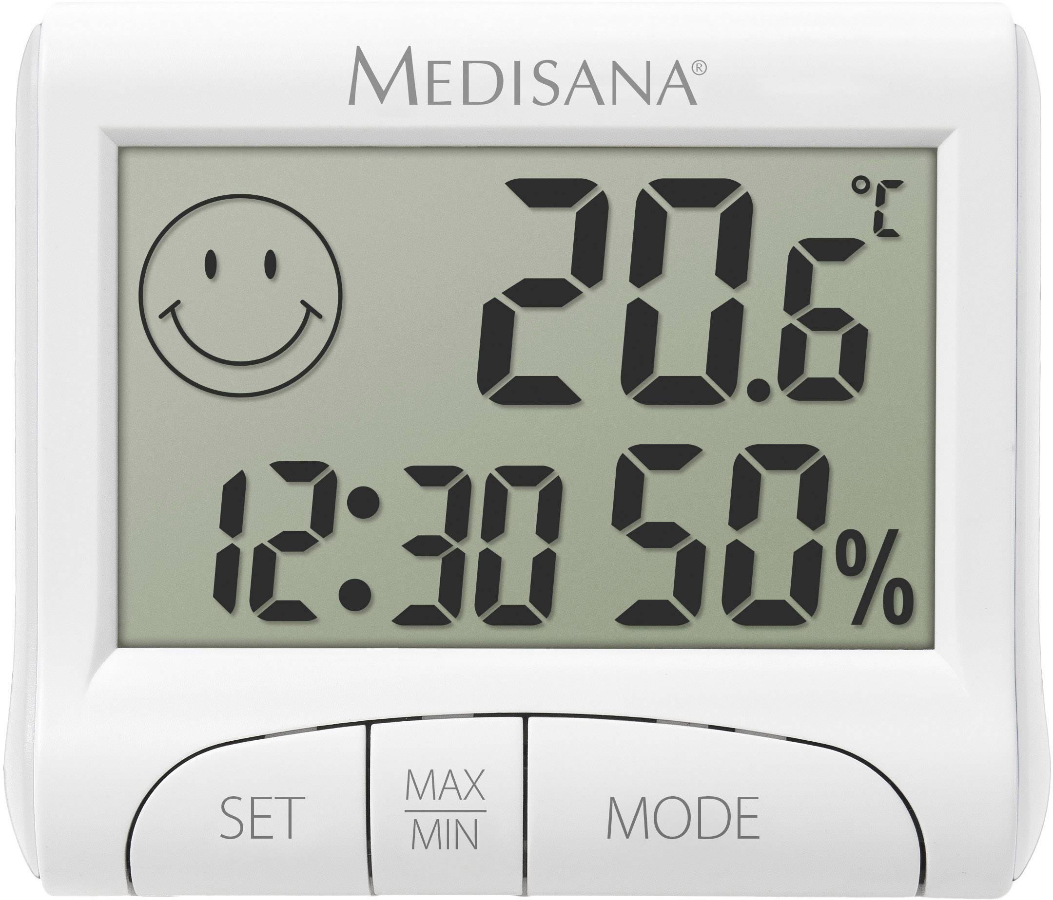 Digitálny teplomer ukazuje 20,6 stupňov Celzia, 50% vlhkosti vzduchu a čas 12:30. Úsmevná tvár vľavo hore.