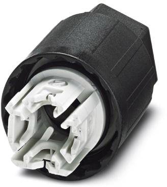 Čierny valcový konektor s bielymi vnútornými časťami. Slúži na elektrické prepojenie v technických zariadeniach.
