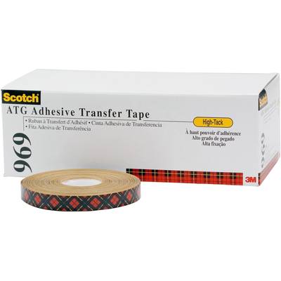 Kotúč lepiacej pásky Scotch ATG leží pred obalom. Obal je označený nápisom "Adhesive Transfer Tape" a ďalšími detailmi.