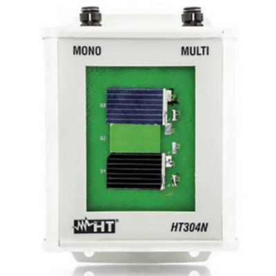 Elektrické zariadenie, označené štítkami 'MONO', 'MULTI' a 'HT304N', zobrazuje zapojené elektronické komponenty na zelenej doske plošných spojov.