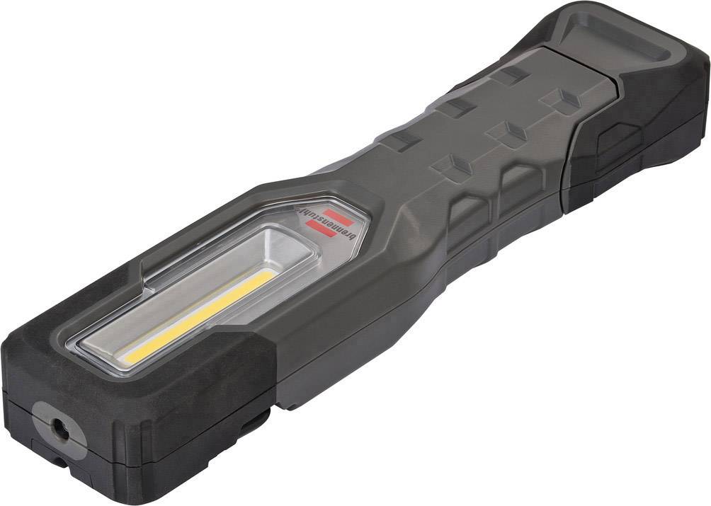 Čierna, obdĺžniková LED baterka s integrovanou rukoväťou a žltým svetelným pruhom v strede, položená vodorovne.