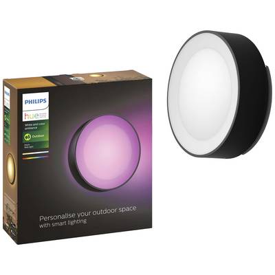 Philips Hue Outdoor Light v krabici, ktorá zobrazuje okrúhle LED vonkajšie svetlo meniace farbu. Text: 'Personalizujte si vaše vonkajšie priestory pomocou inteligentného osvetlenia'.
