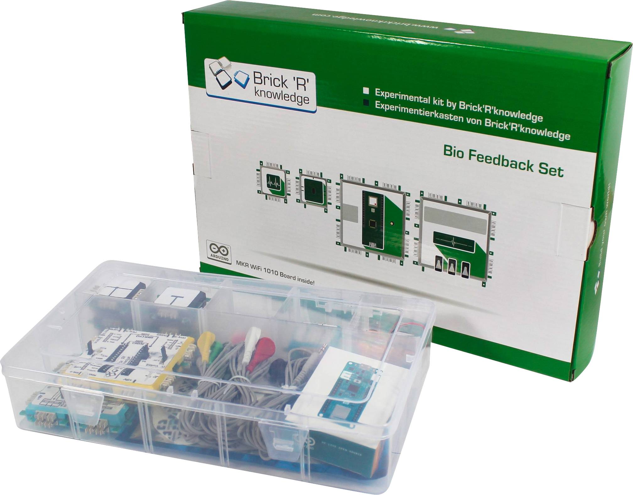 Experimentálna sada elektronických komponentov v priehľadnej krabici. Zelený kartón zobrazuje diagramy a text 'Bio Feedback Set'.