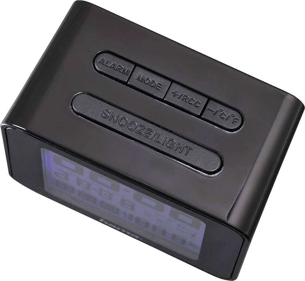 Čierny budík s viacerými tlačidlami hore: 'ALARM', 'MODE', '+/RCC', '-/CF', 'SNOOZE/LIGHT'. Digitálny displej zobrazuje čas a dátum.
