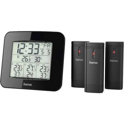 Digitálny teplomer s hodinami, dátumom a teplotným displejom. Zobrazuje 22,3 °C vnútri a 27,1 °C vonku. Dva čierne senzory vedľa neho.