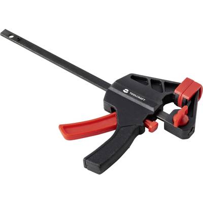 Čierna skrutková svorka so červeným držadlom a červenou upínacou čeľsťou od značky Toolcraft. Vhodná na uchytávanie objektov.
