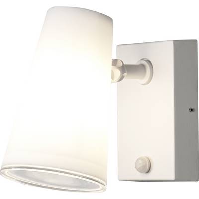 Biela nástenná lampa s valcovým tienidlom, ktoré svieti smerom nadol.