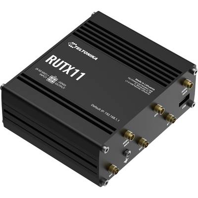 Čierny priemyselný smerovač Teltonika RUTX11 s viacerými portmi antén a portami Ethernet/USB na bielom pozadí.