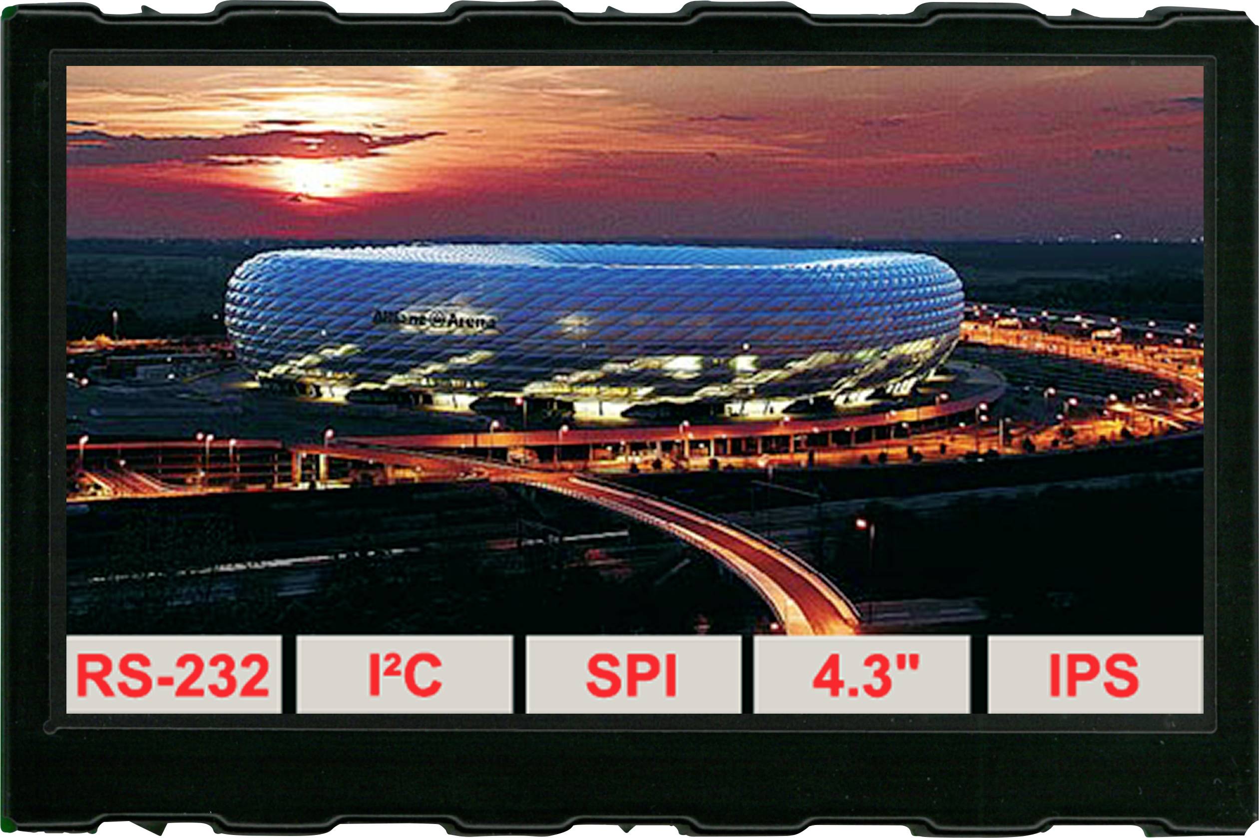 Štadión osvetlený pri západe slnka, predtým dopravné cesty. Text na okraji obrazovky zobrazuje: 'RS-232', 'I²C', 'SPI', '4.3"', 'IPS'.