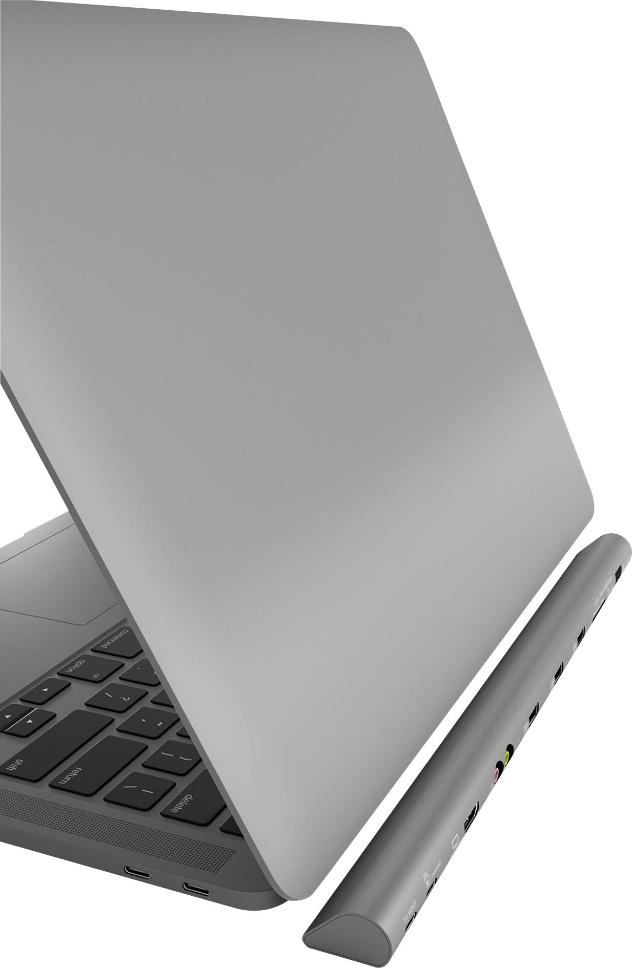 Čiastočne zatvorený notebook s dokovacou stanicou, ktorá ponúka viaceré možnosti pripojenia vrátane USB a HDMI.