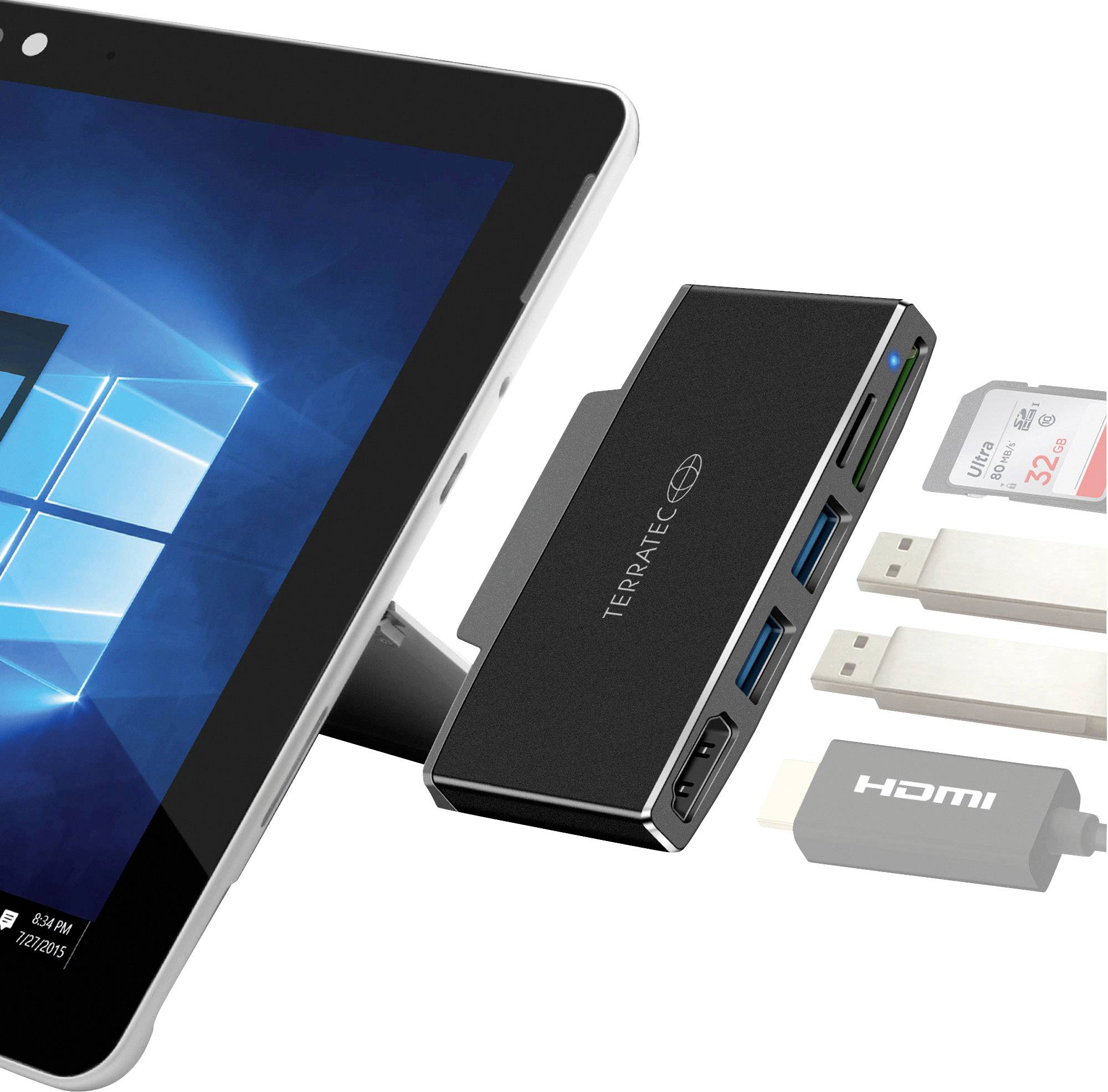 Tablet s pripojeným USB rozbočovačom značky Terratec. Rozbočovač má viaceré porty vrátane USB, HDMI a čítačky SD kariet.
