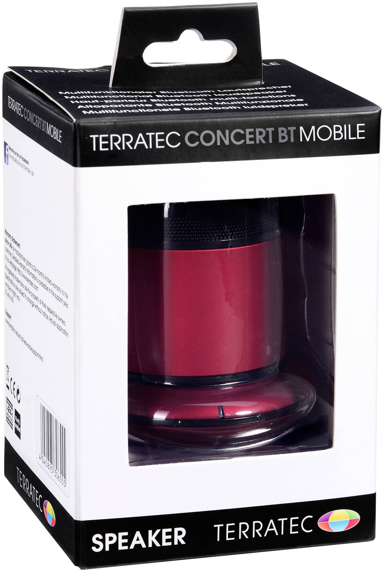 Obal s nápisom 'Terratec Concert BT Mobile Speaker' cez priehľadné okienko ukazuje červený bluetooth reproduktor.