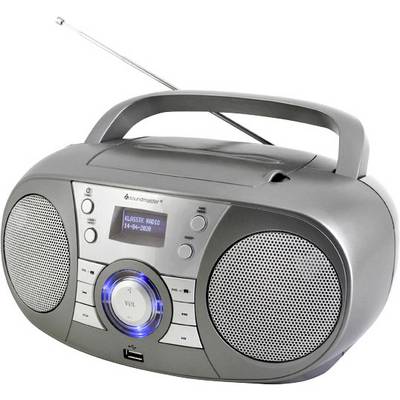 Prenosné rádio s anténou, reproduktormi a digitálnym displejom zobrazujúcim 'Klassik Radio'.