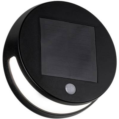 Okrúhla čierna solárna lampa so solárnym panelom na vrchu a pohybovým senzorom. LED svetlá na spodnej strane poskytujú svetlo v tme.
