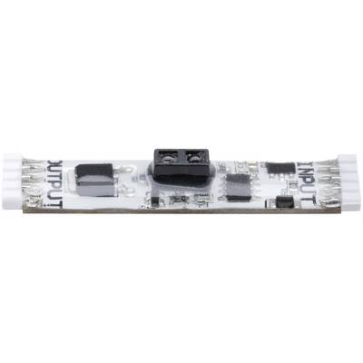 Detailný záber elektronickej dosky plošných spojov s označeniami "INPUT" a "OUTPUT". Komponenty sú namontované na malej, úzkej doske.
