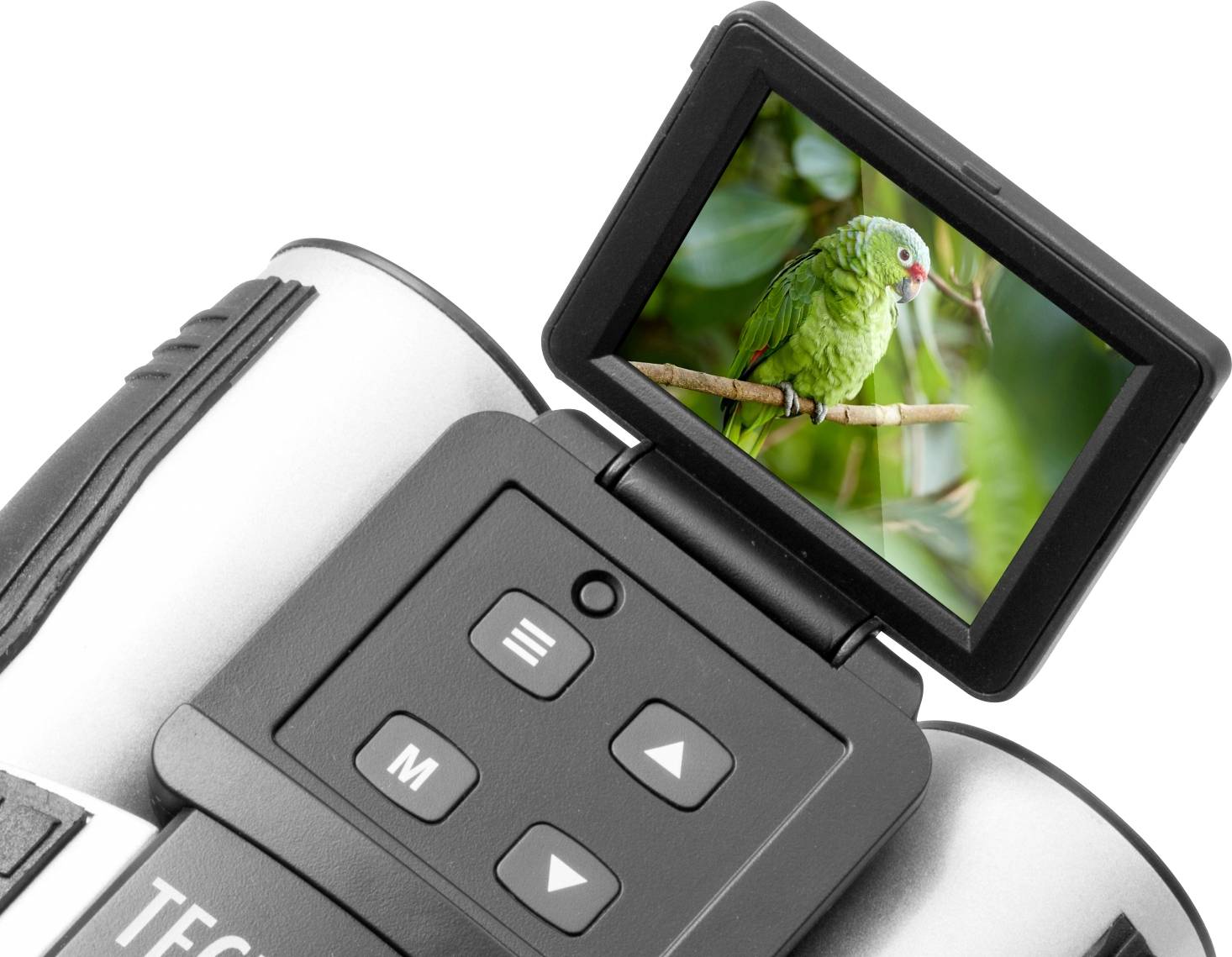 Digitálny fotoaparát s výklopným displejom, ktorý zobrazuje zeleného papagája sediaceho na konári. Technické ovládacie prvky sú viditeľné.