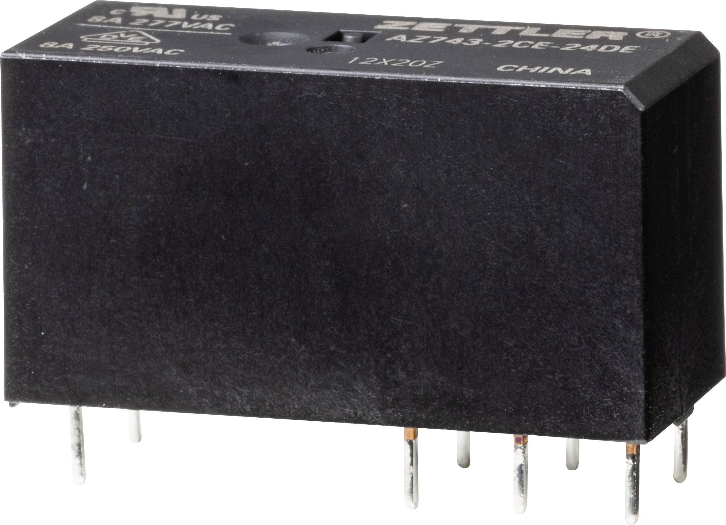 Čierne elektronické relé s nápisom 'Zettler'. Má niekoľko kovových kolíkov na spodnej strane pre elektrickú spojku.
