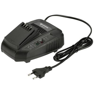Čierna nabíjačka s káblom a elektrickým kontaktom. Na prednej strane sú stavové kontrolky a priestor na vloženie batérie.